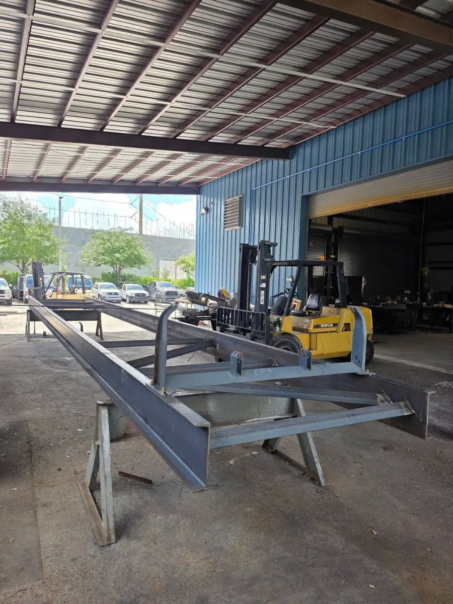 Steel trailer frame fabricated outside the TL Welding shop in Medley, Florida