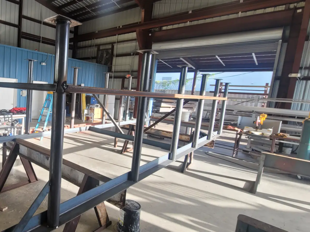 Custom structural steel frame in progress on the TL Welding shop floor in Medley, Florida