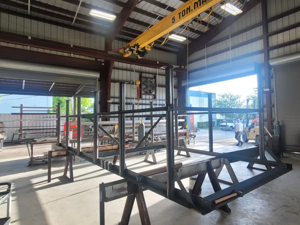 5-ton overhead crane above a custom steel frame in TL Welding's Medley fabrication bay