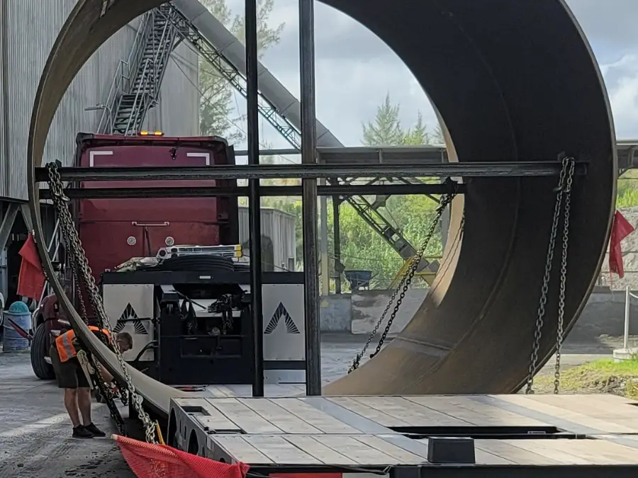 Oversize fabricated steel section loaded for transport at a South Florida plant