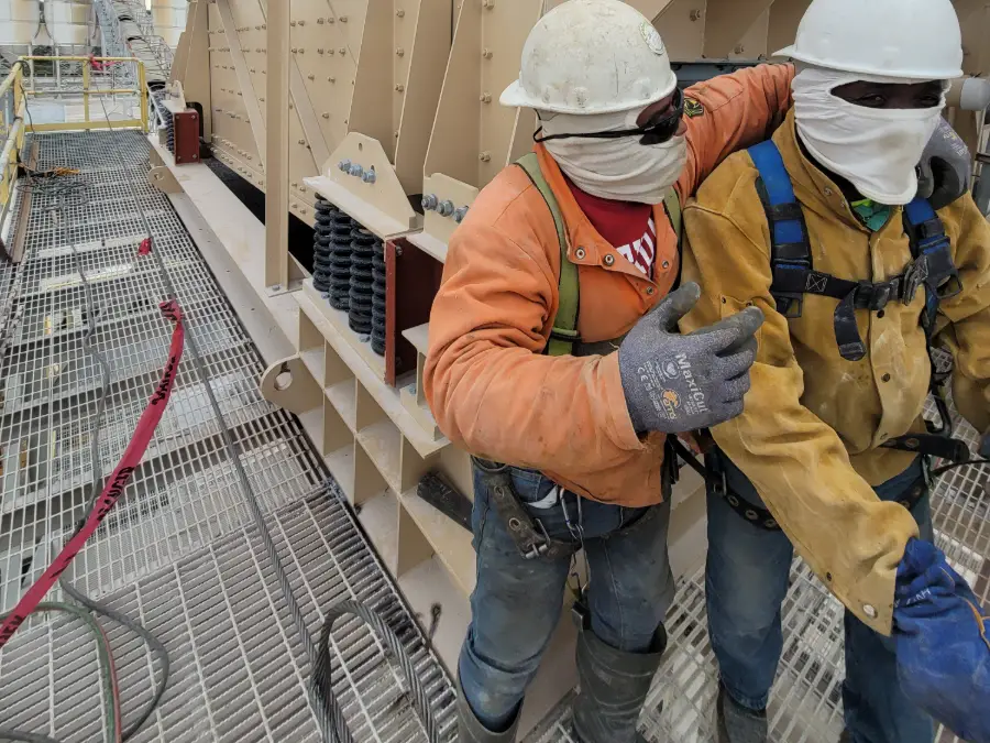 TL Welding installation crew setting a new screen machine at a South Florida quarry plant